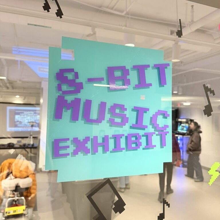 The 8-bit music exhibit sign at the gallery